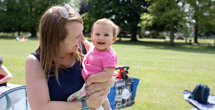 Woman holding a baby