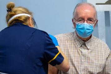 Ted the first member of the public in Salford to vaccinated with the COVID-19 vaccine at Salford Royal